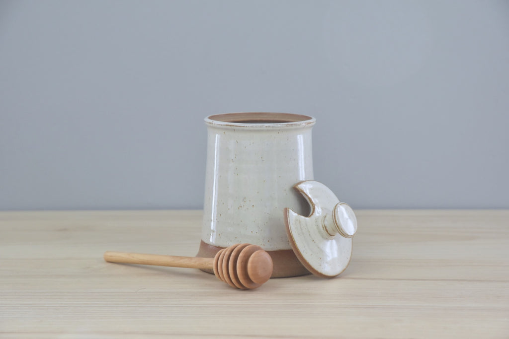 Handmade Honey Pot with Spoon from Dirty South Pottery in Winchester, KY - just outside of Lexington, Kentucky. White Glaze with speckles on dark clay.