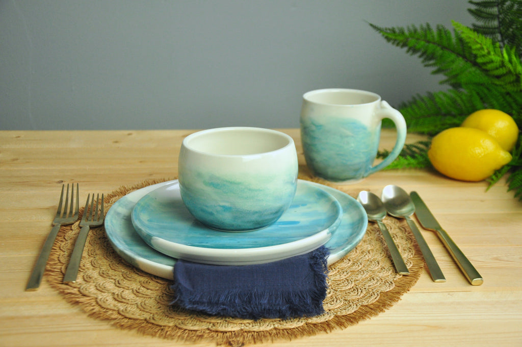 Table setting in WaterColor Collection - Coastal Seaside Blues are painted on these handmade plates. Made in Winchester, KY