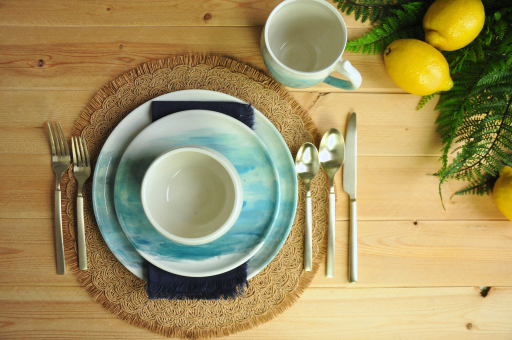 Table setting in WaterColor Collection - Coastal Seaside Blues are painted on these handmade plates. Made in Winchester, KY