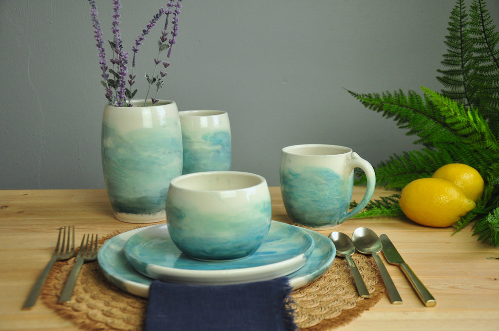 Table setting in WaterColor Collection - Coastal Seaside Blues are painted on these handmade plates. Made in Winchester, KY